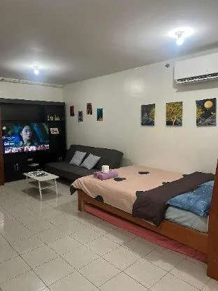 Cozy-Relaxing Condo near Enchanted Kingdom (Woody)