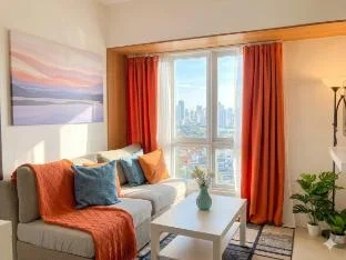Cozy 2BR City View Condo | Work & Family in Metro | Near Filoil Center
