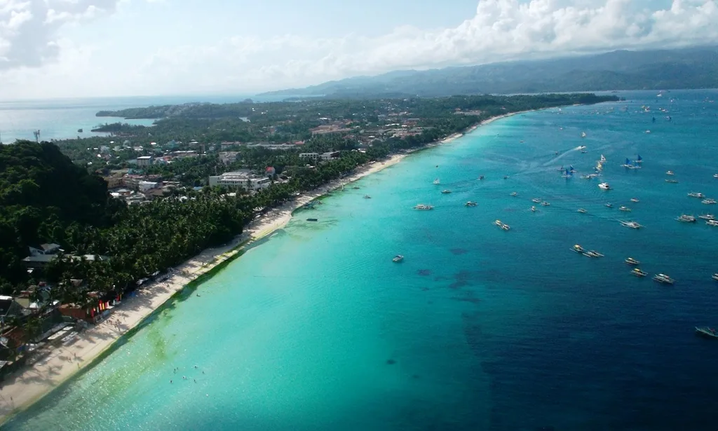 View from Mount Luho summit looking south over Boracay island with White Beach visible on the western coast